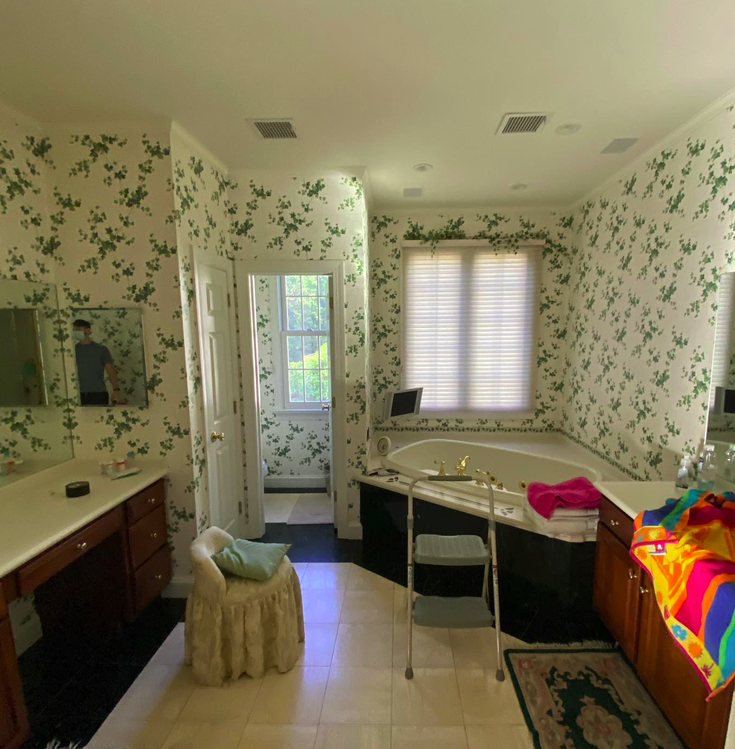 Springfield PA bathroom before renovation showing outdated fixtures and worn surfaces